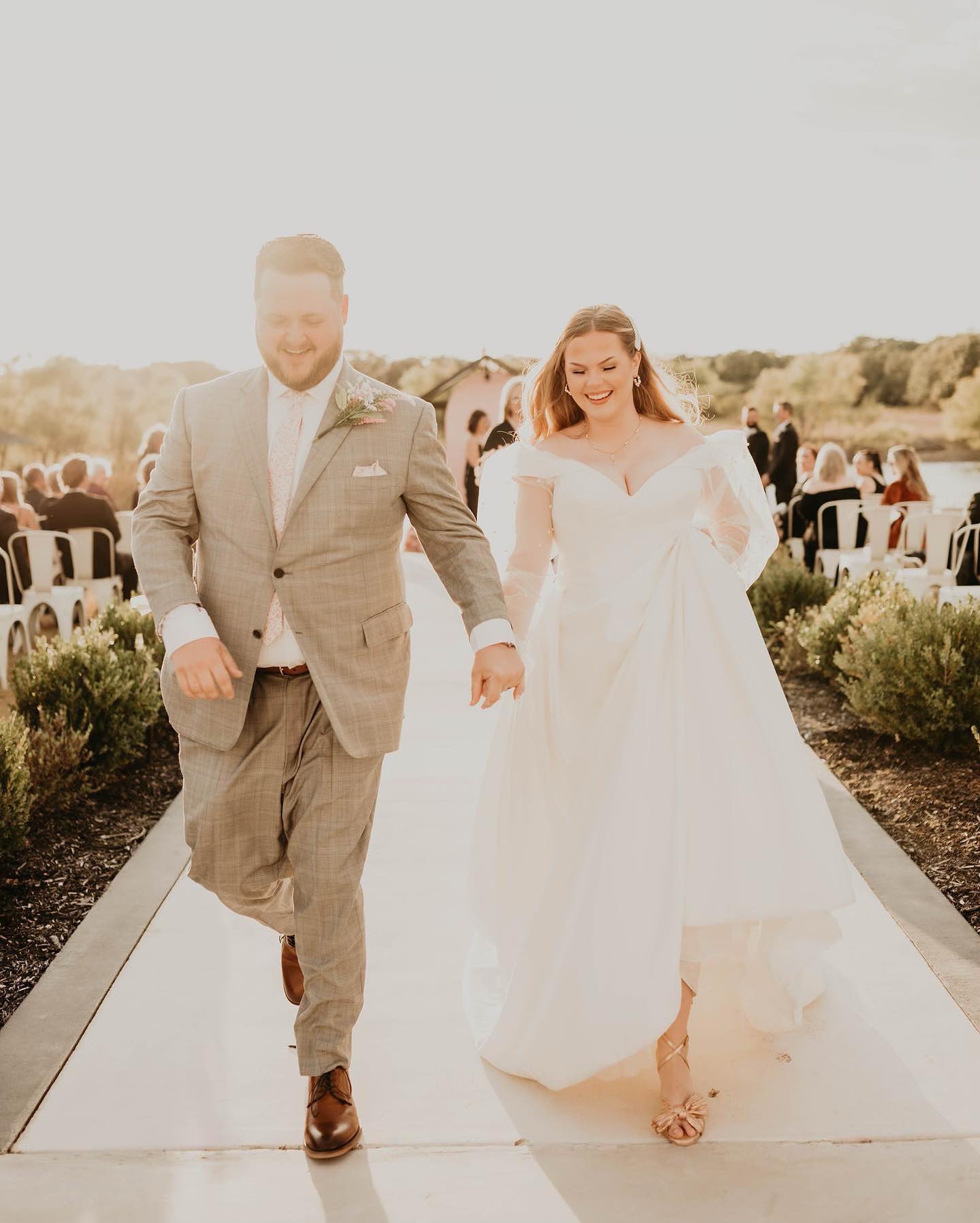Wedding couple sharing a kiss overlooking the Sierra Nevada mountains at Forest House Lodge