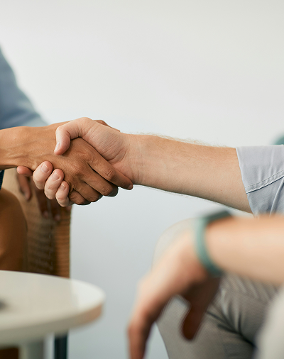 Two people shaking hands
