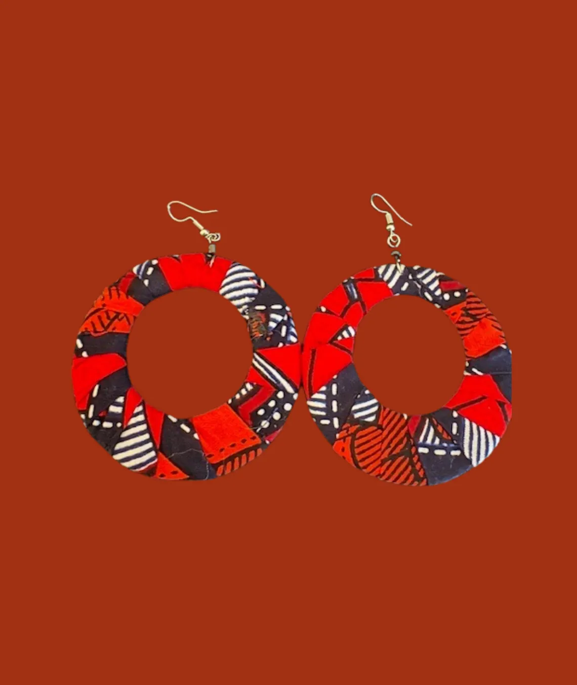 Colorful African print fabric hoop earrings on red background