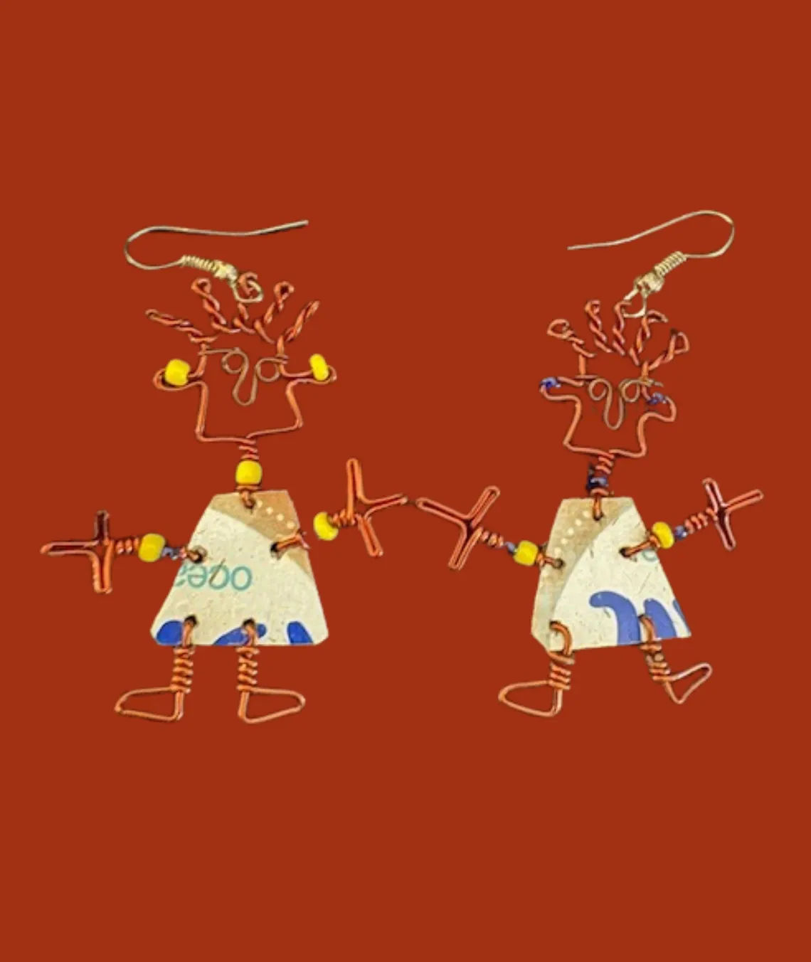 Two wire figures with paper bodies against a rust-colored background