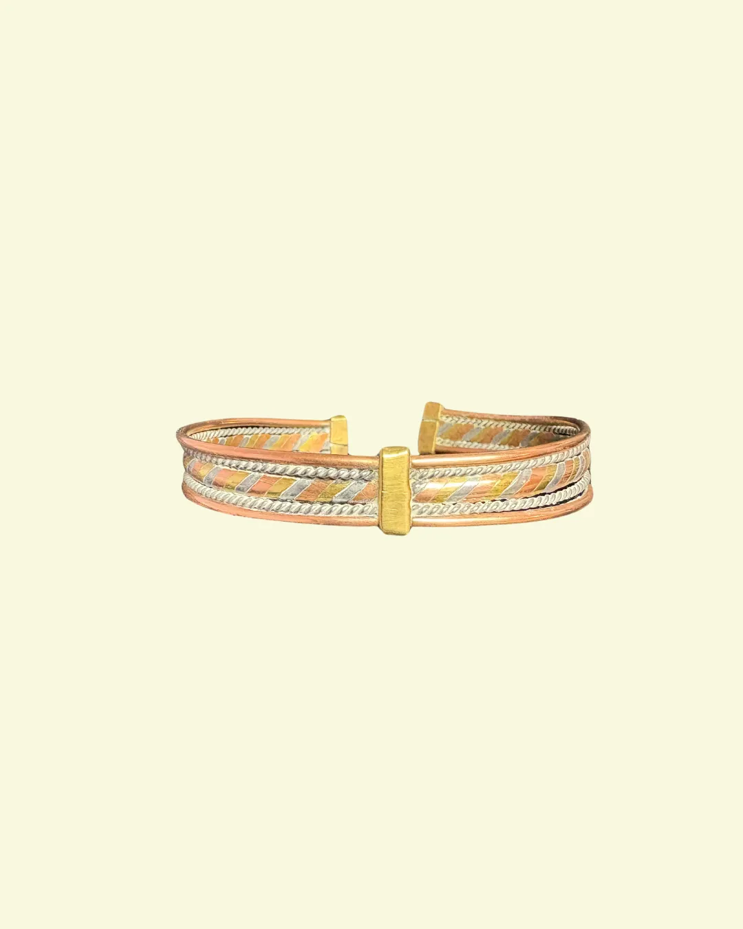Mixed metal twisted wire cuff bracelet with gold center accent
