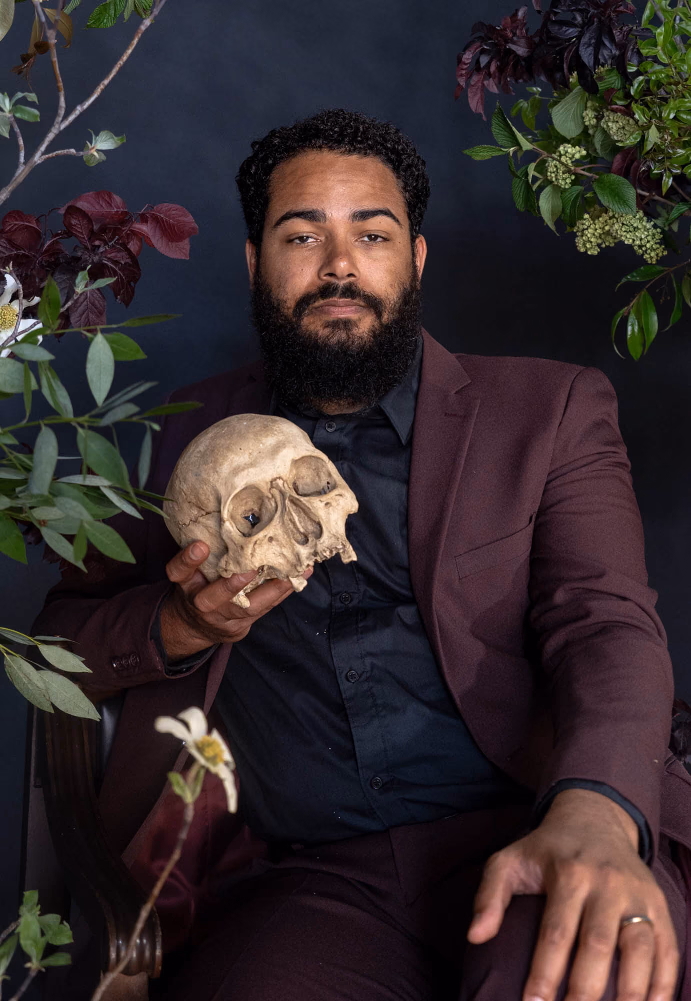 Photo of comedian Curtis Cook holding a skull taken by Lex Voight.