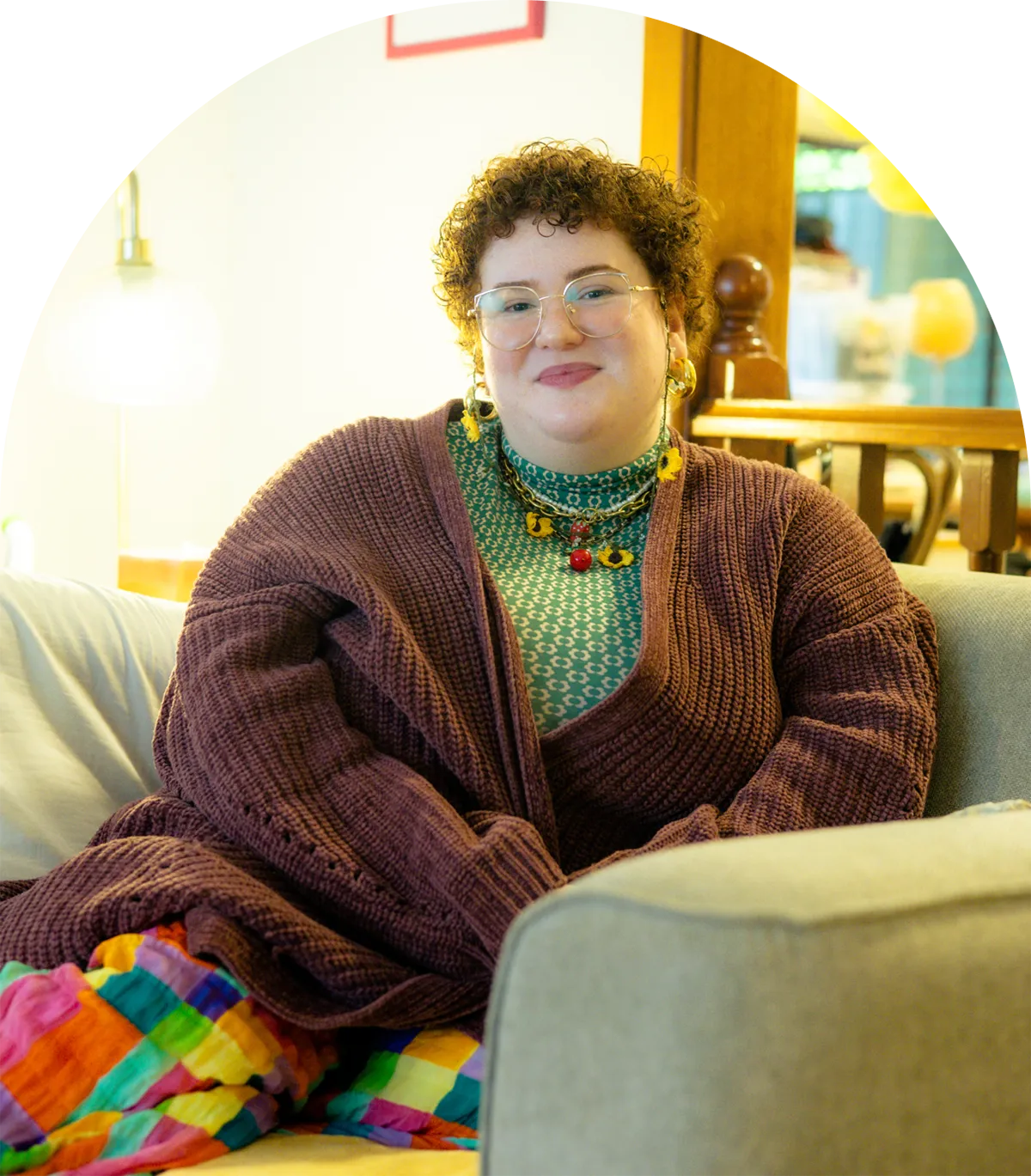 A photo of Emilia sitting on their couch