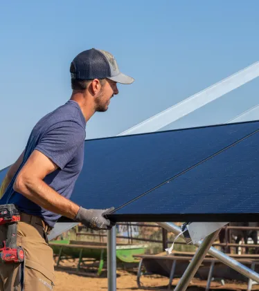 Man instaling solar panels