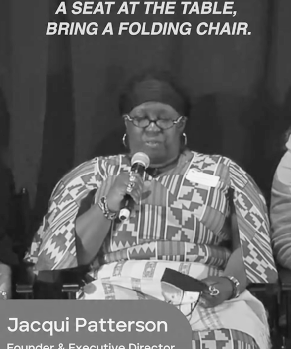 Thumbnail of Jacqui Patterson, founder and executive director of The Chisholm Legacy Project, seated and speaking into a microphone about intersectional climate justice.