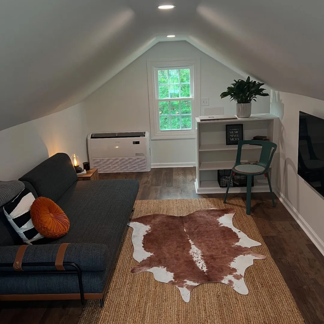 An attic that has been converted into a bonus room and office in a Greenville, NC house