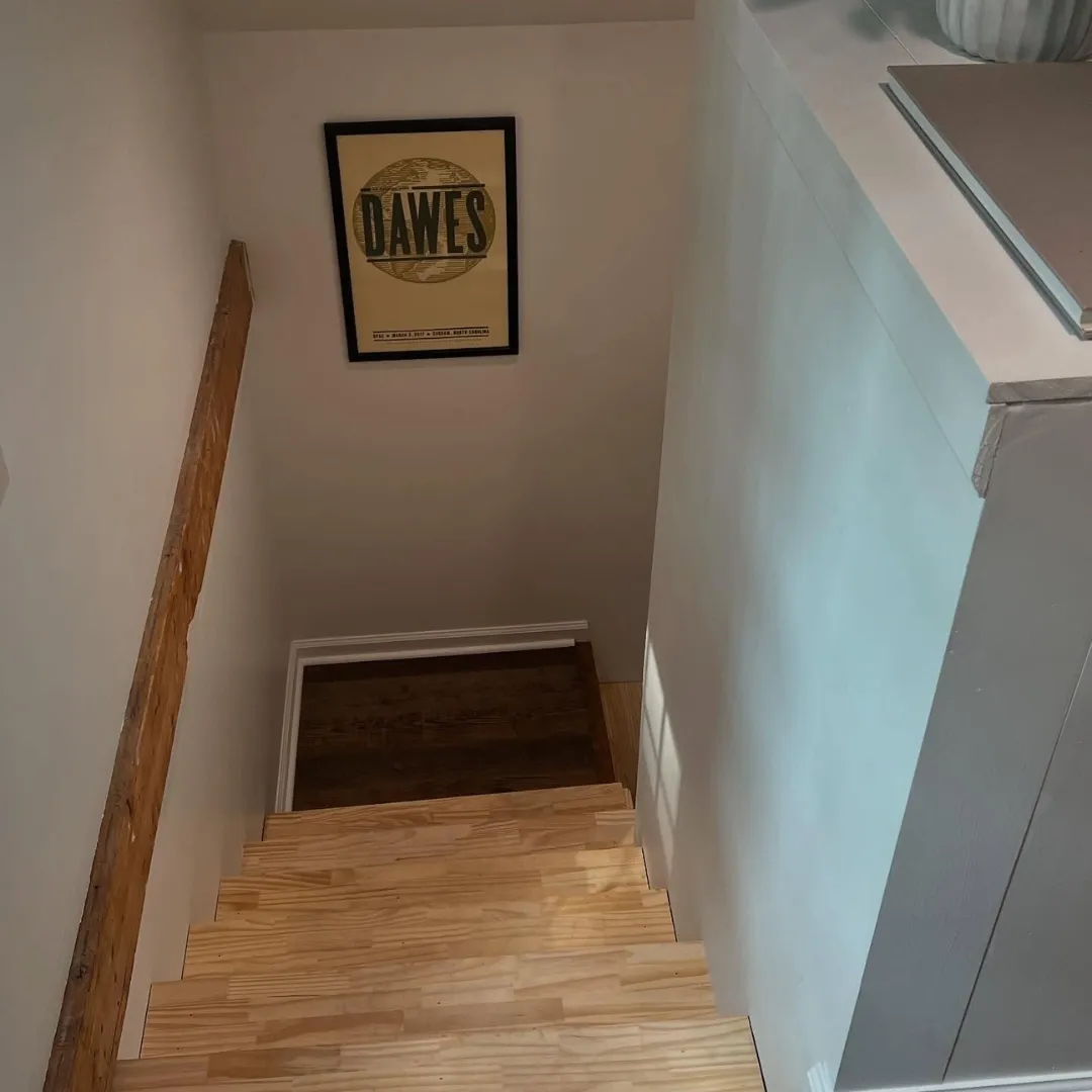A staircase that has been remodeled by Lee Brothers Construction as part of an attic conversion