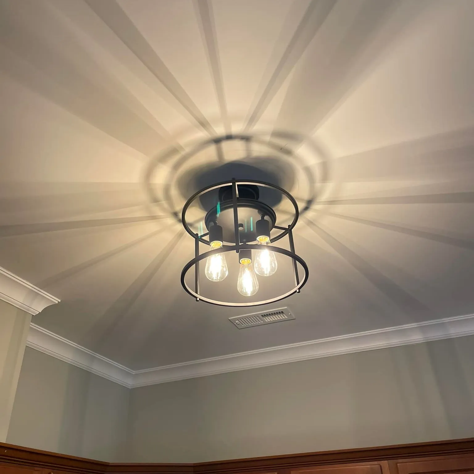 An indoor lighting fixture that has been upgraded by Lee Brothers Construction