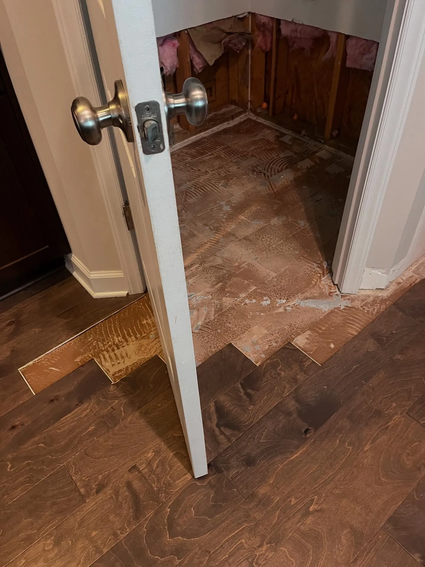 A before photo showing a floor that is needing to be renovated by lee brothers construction