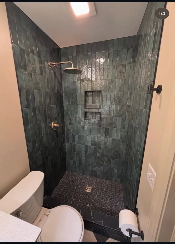 A shower that has been remodeled by Lee Brothers Construction