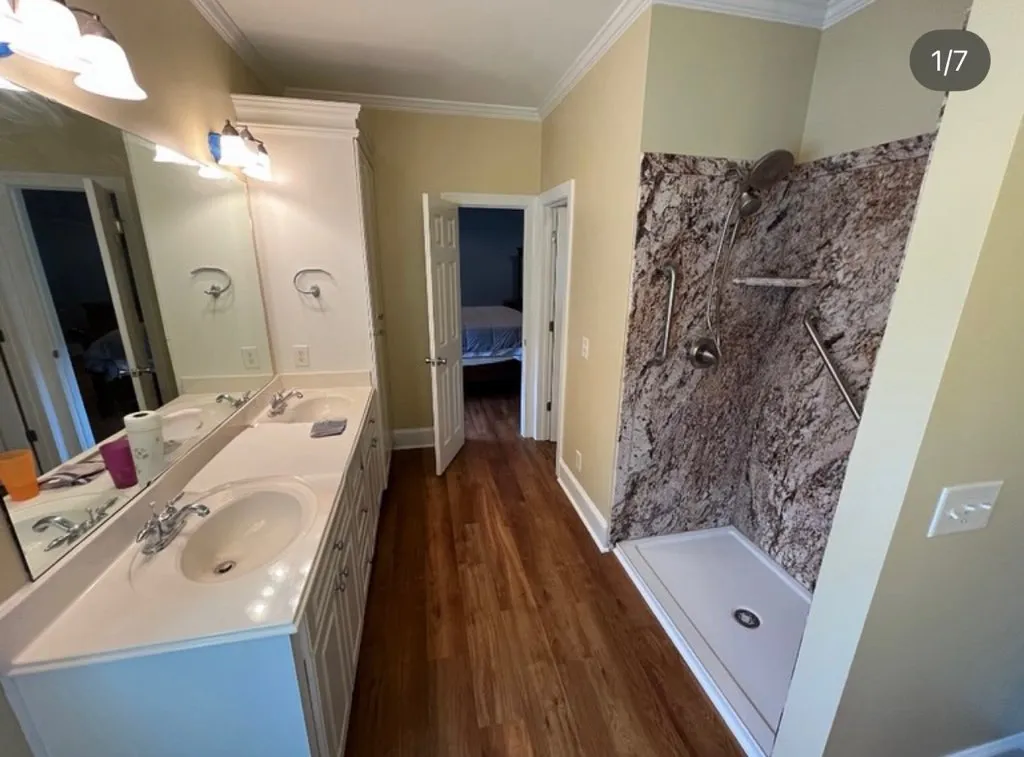 A bathroom remodel that has been done by lee brothers construction with a new shower install