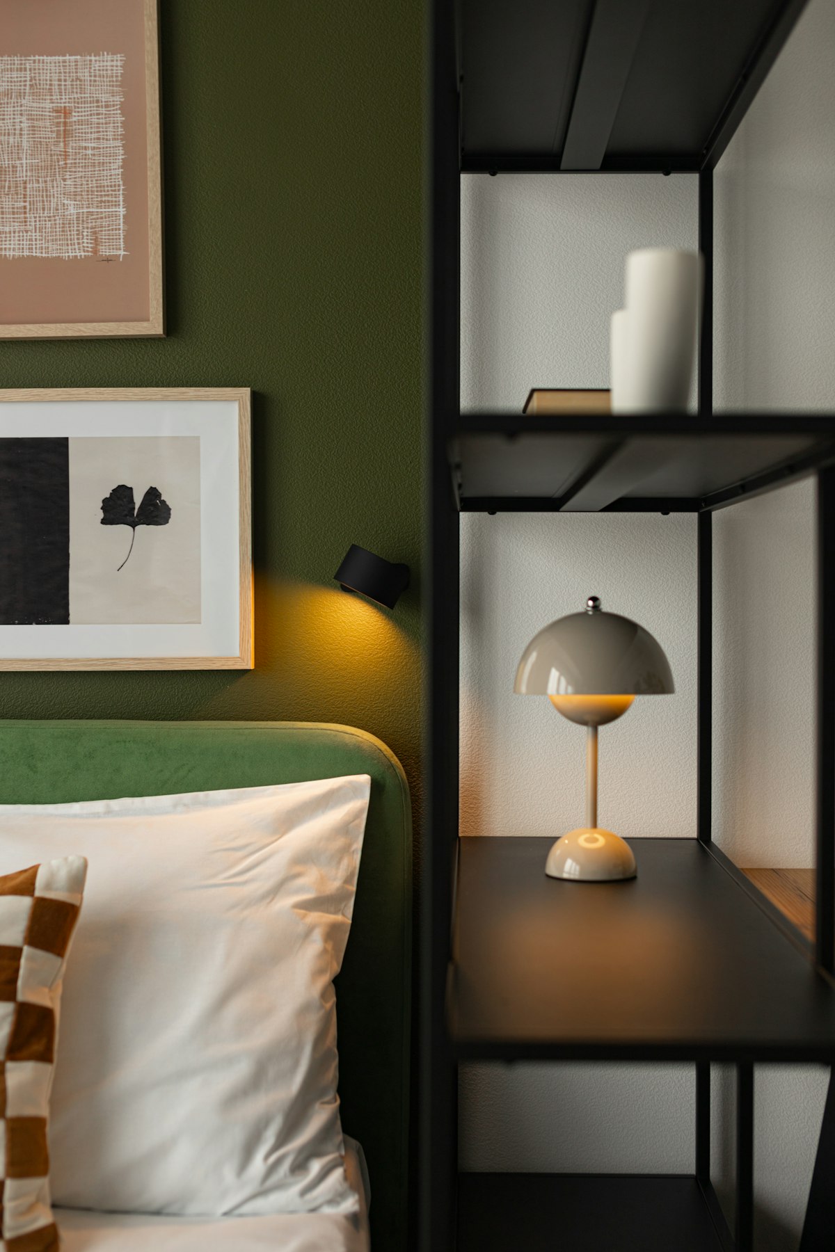 House surrounded by trees, bushes, and layered foundation plantings