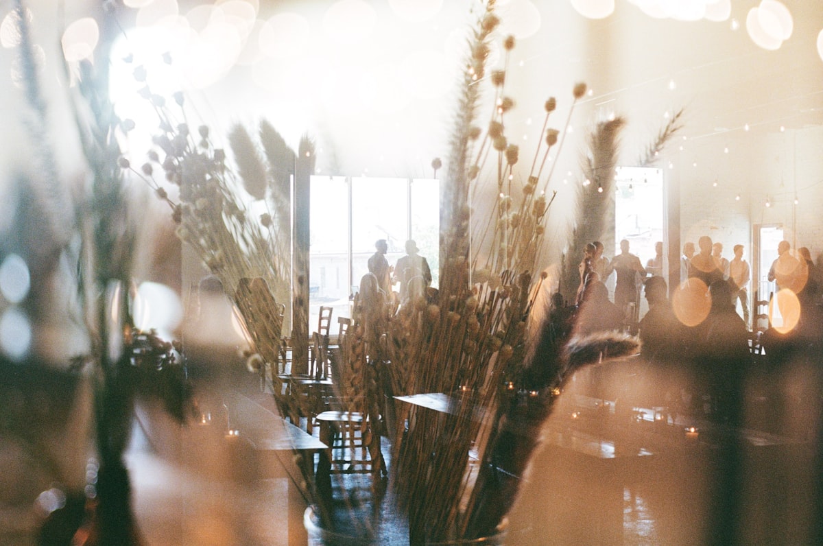 Fire pit with chairs arranged around it on a backyard patio