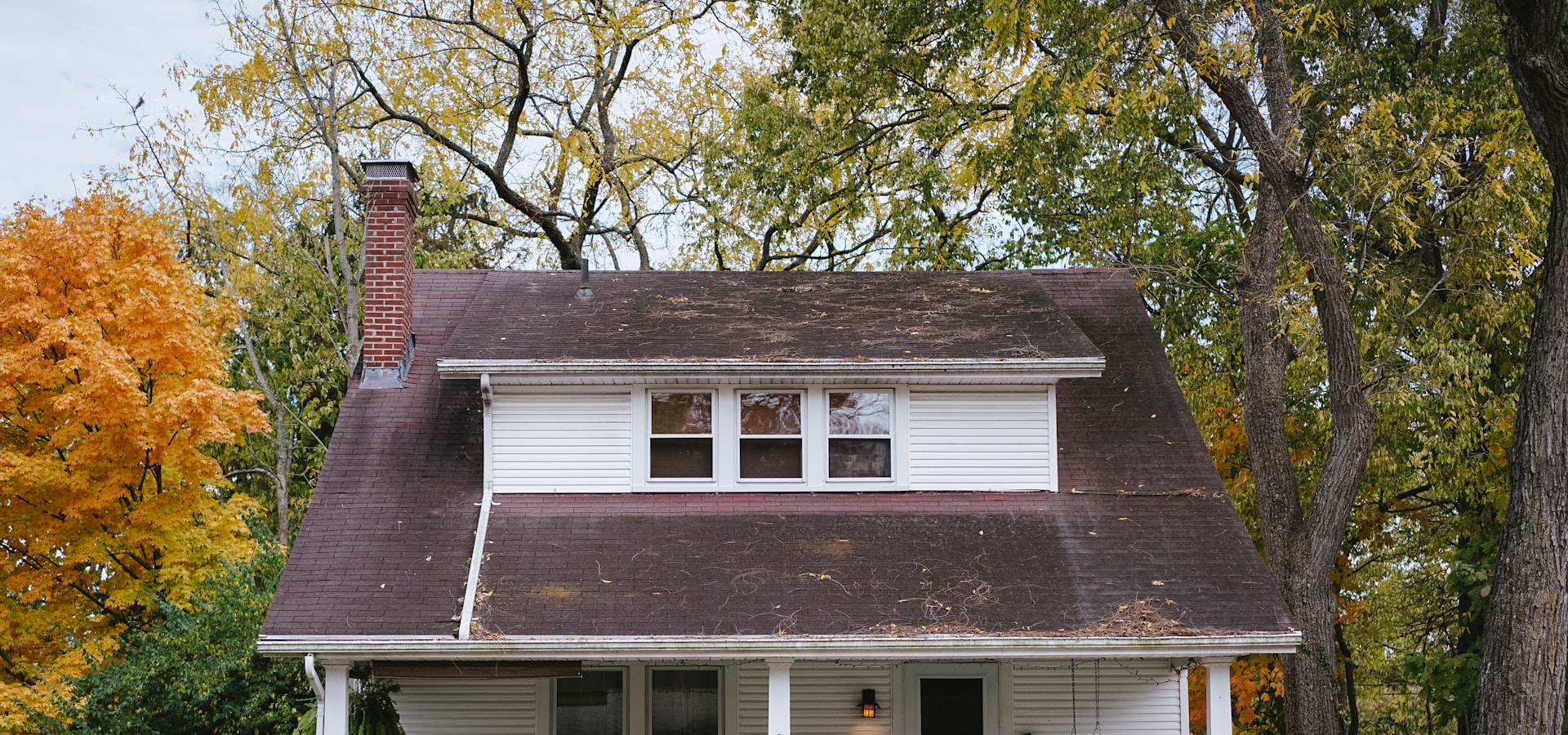 Classic American home with front porch and autumn foliage in Vienna, Virginia