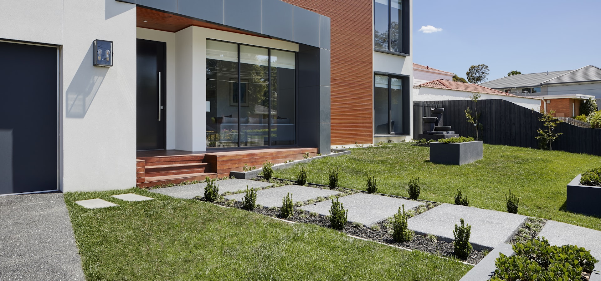 Contemporary home with paver walkway and landscaping in Centreville, Virginia