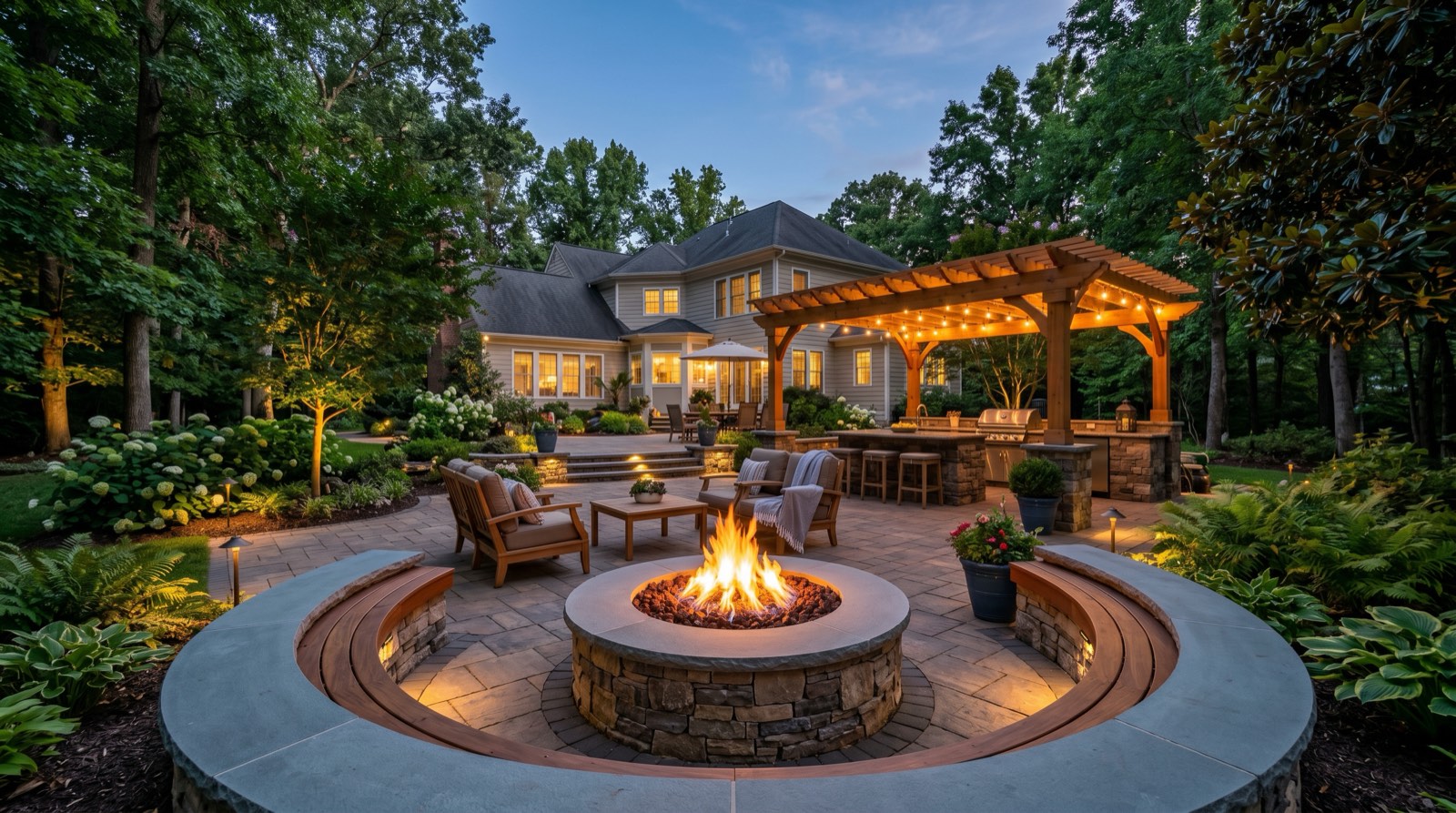 Premium Northern Virginia outdoor living space with gas fire pit seat walls paver patio and landscape lighting