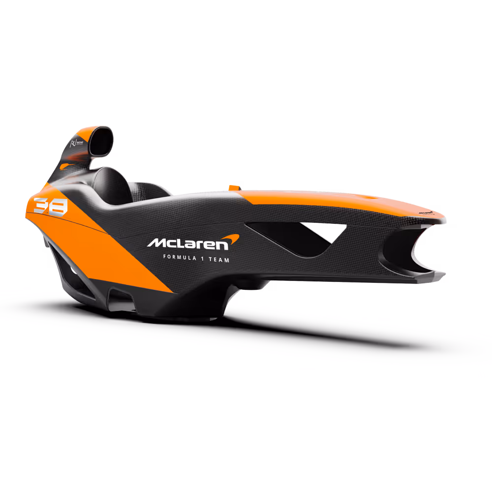 Side view of the McLaren Racing Motion Simulator by Racing Unleashed with a livery inspired by the victorious MCL38. This livery pays homage to McLaren Racing’s 2024 Constructors' Championship triumph.