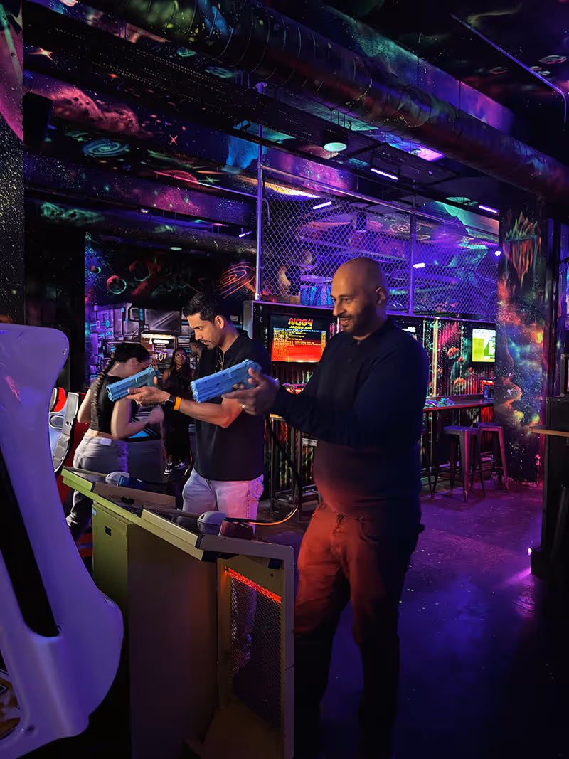 People playing video games.