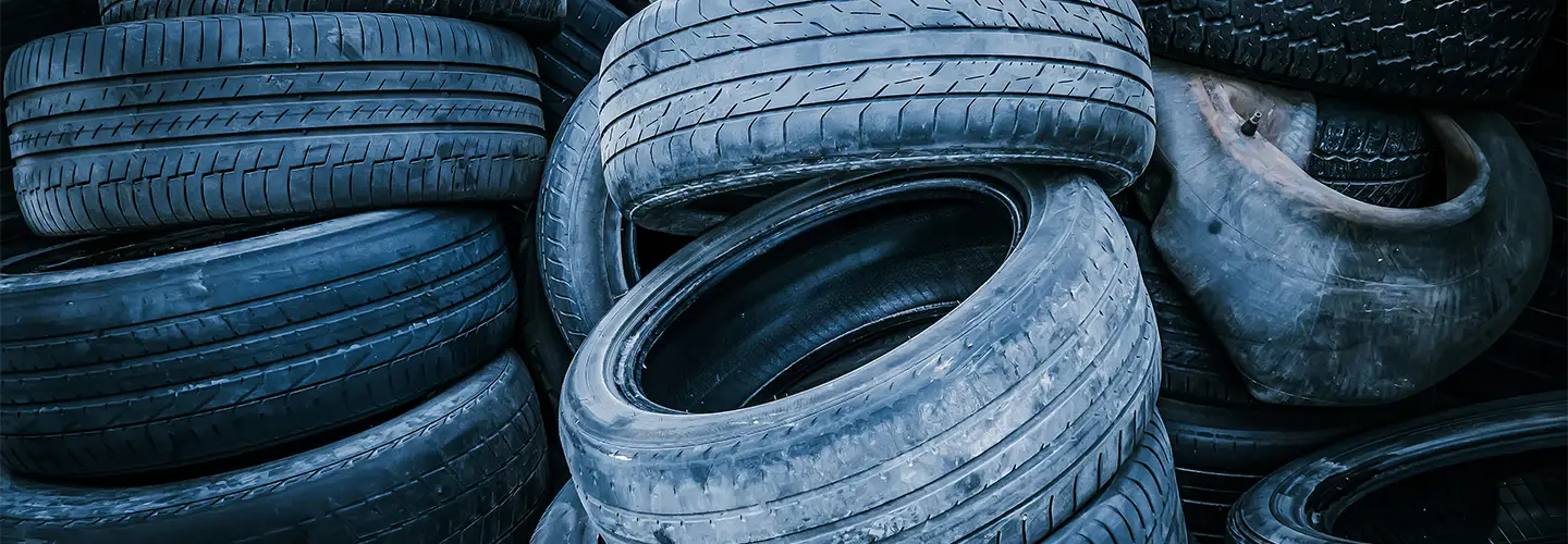 Old tires, showcasing Dohmeyer capabilities in recycling industry.