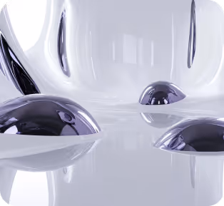 Glossy metallic and smooth white surfaces with abstract rounded shapes and reflective spheres in a minimalistic setting.