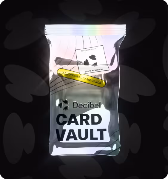 Shiny silver foil pack labeled 'Decibel Card Vault' with a yellow label stating '3 Additional Game Cards' and an image of a card inside.