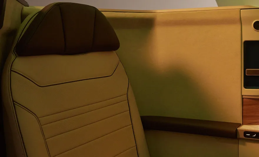 The interior of a plane with a wood trim.