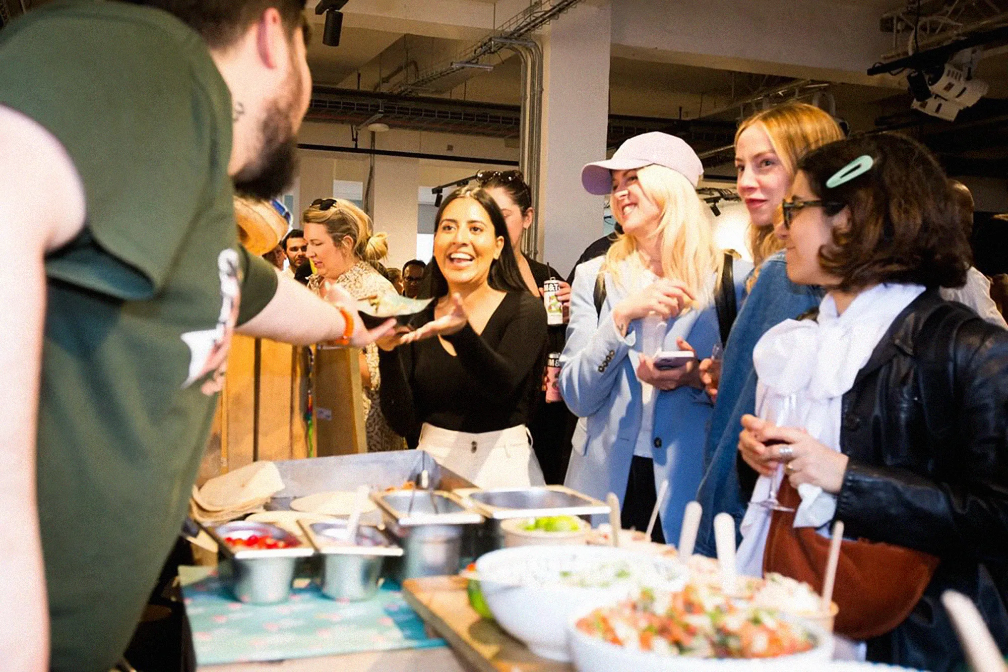Guests at a work party trying street food