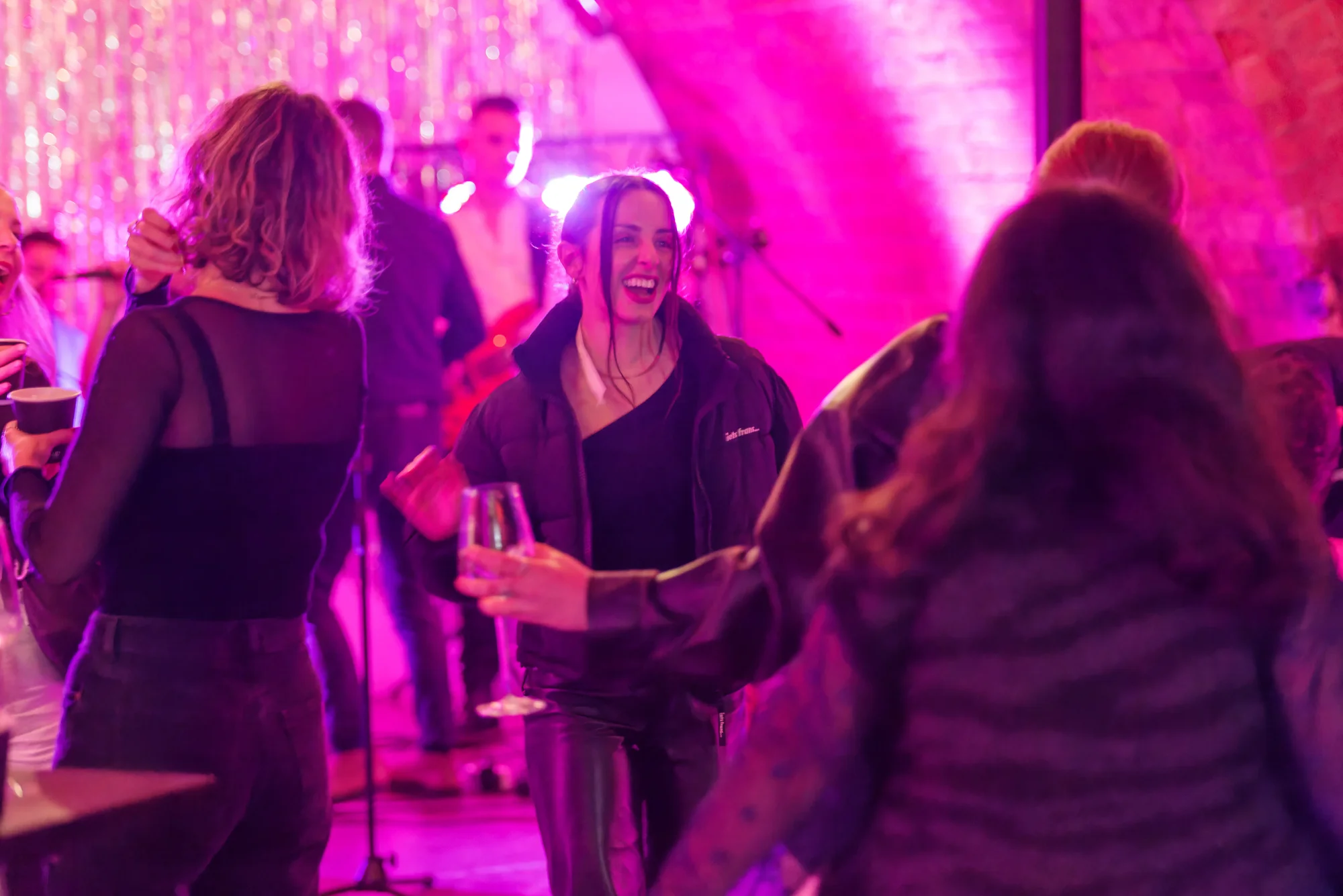 Guests enjoying themselves at a work party organised by Togather