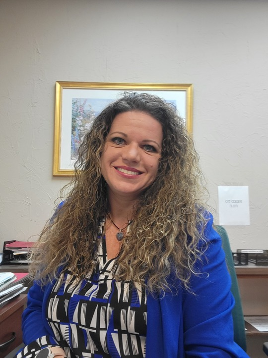 Candice Schultz, experienced legal assistant in family law with associate degrees in Criminal Justice and Psychology,