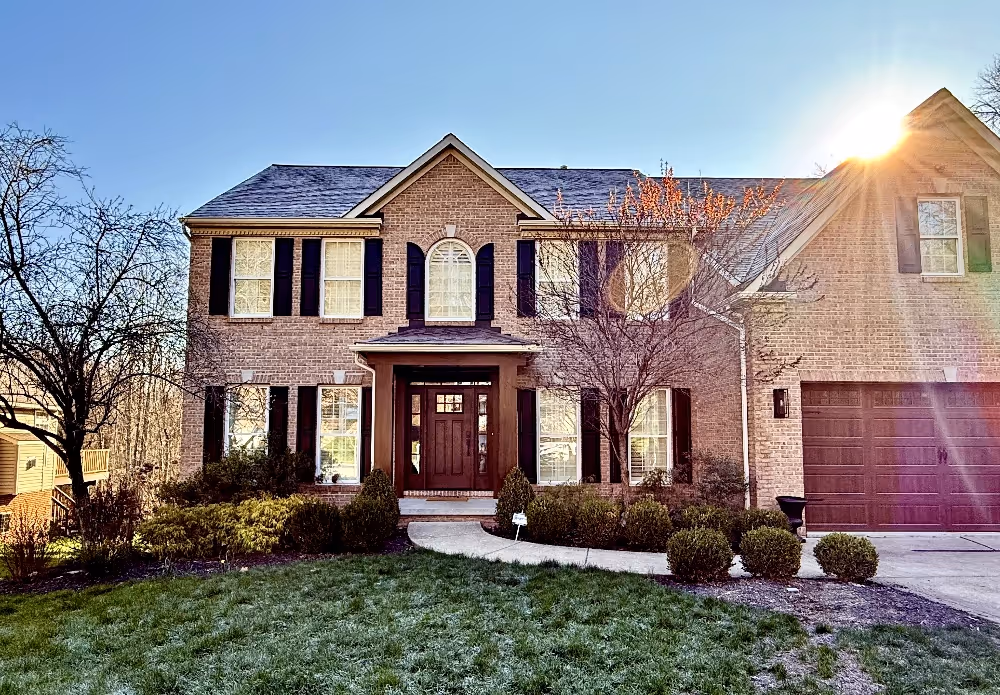 Exterior of house with new windows and doors
