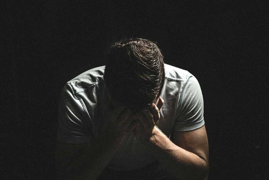 Person worried about loan default - financial stress debt concerns borrower anxiety concept