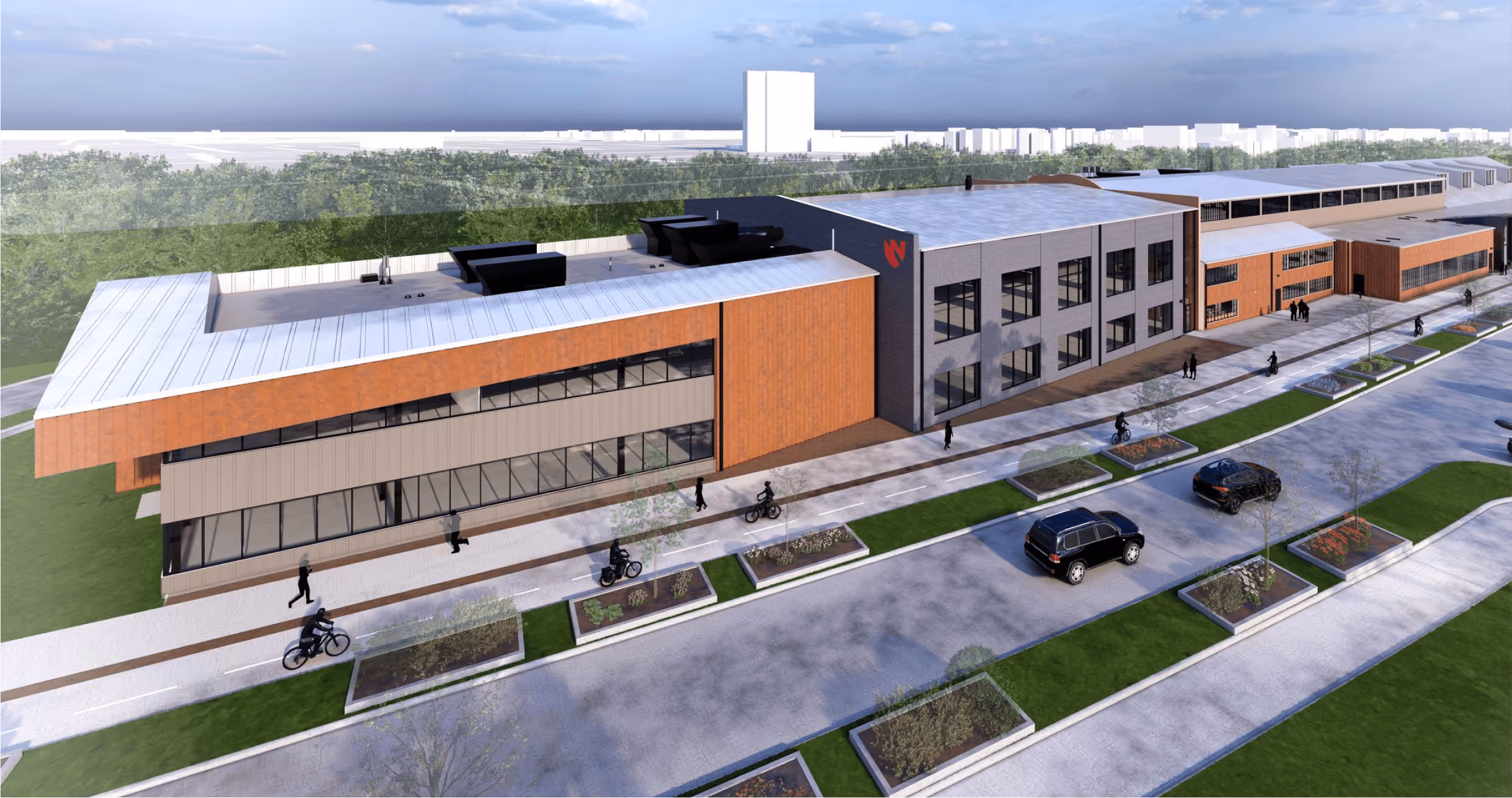 Modern two-story commercial building with orange and gray exterior walls, large windows, sidewalks, parked cars, and cyclists.
