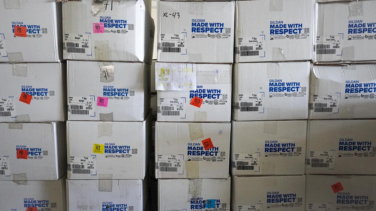 A stack of boxes with the words Made with Respect on them.