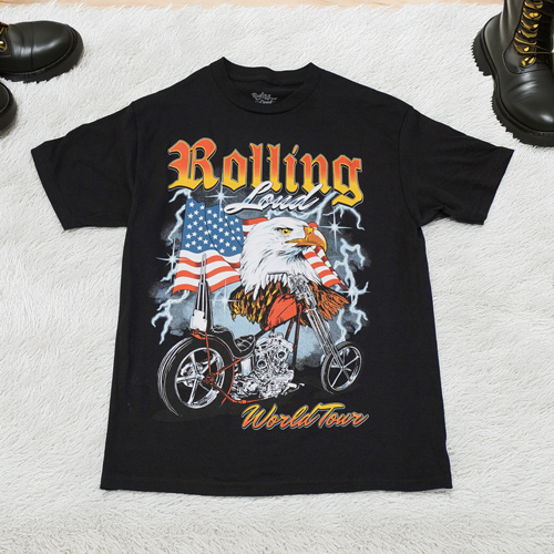 a black Rolling Loud concert shirt with a picture of an eagle and a flag on it