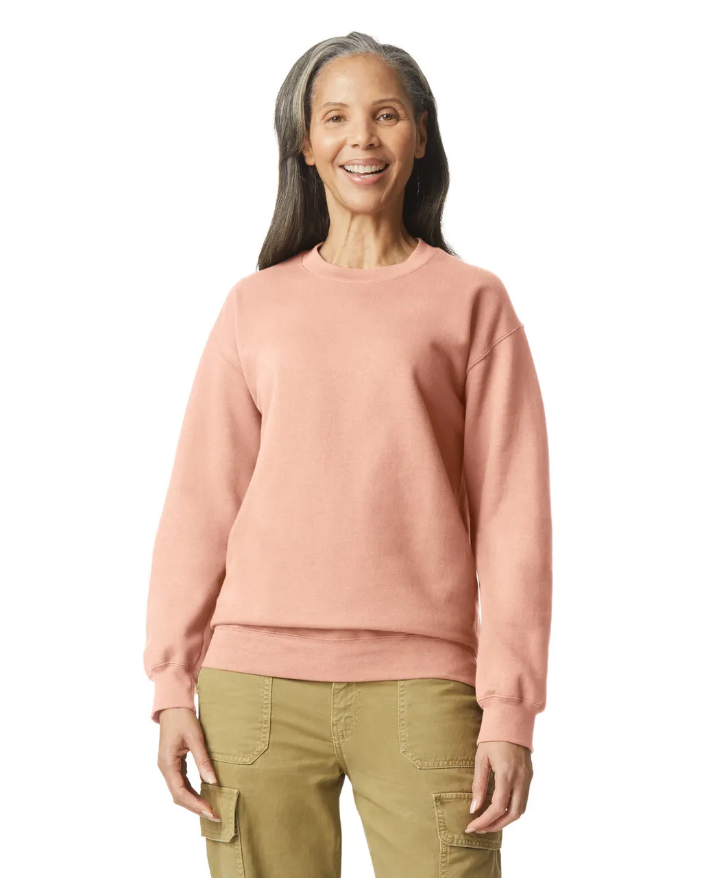 a woman wearing a pink sweater