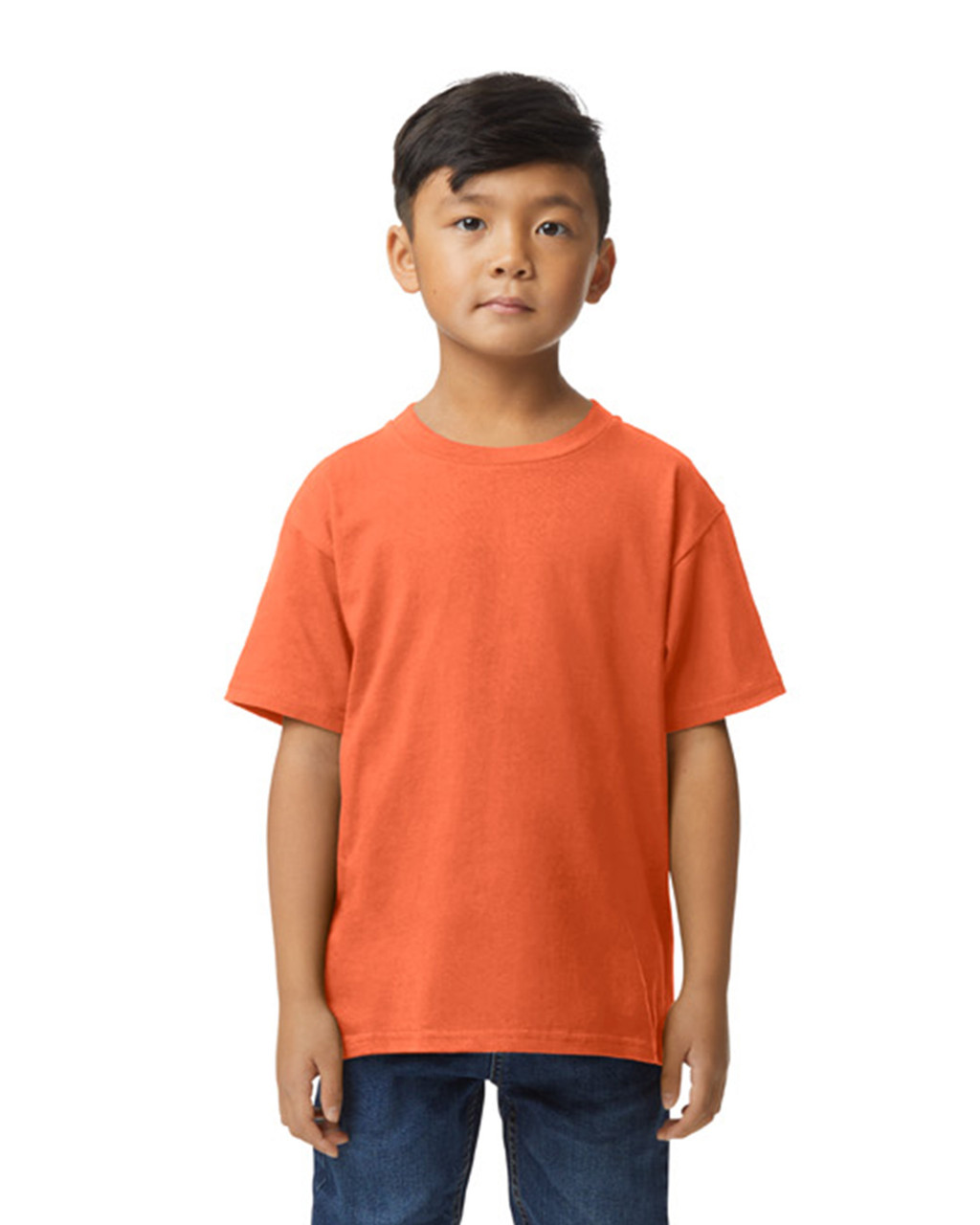 a boy wearing an orange shirt