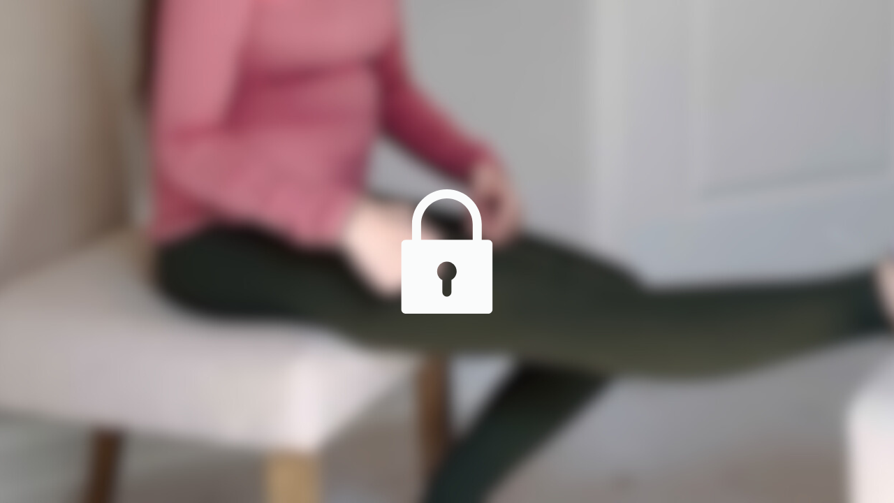 Locked padlock icon over blurred image of person sitting