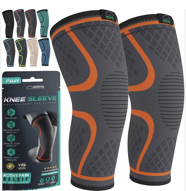 Compression knee sleeves in gray and orange with product packaging