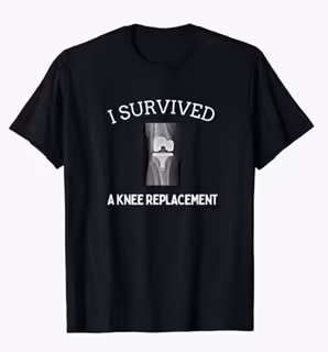 Black t-shirt with X-ray of knee and text 'I Survived a Knee Replacement'