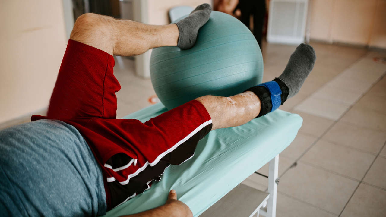 Man exercising leg