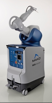 Mako robotic arm surgical assistance system on a medical cart