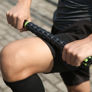 Person using foam roller for muscle recovery on knee