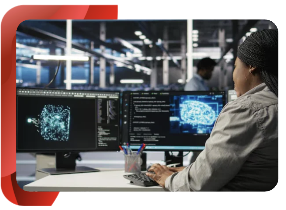 Software developer monitoring an ai automation implementation on dual screens.