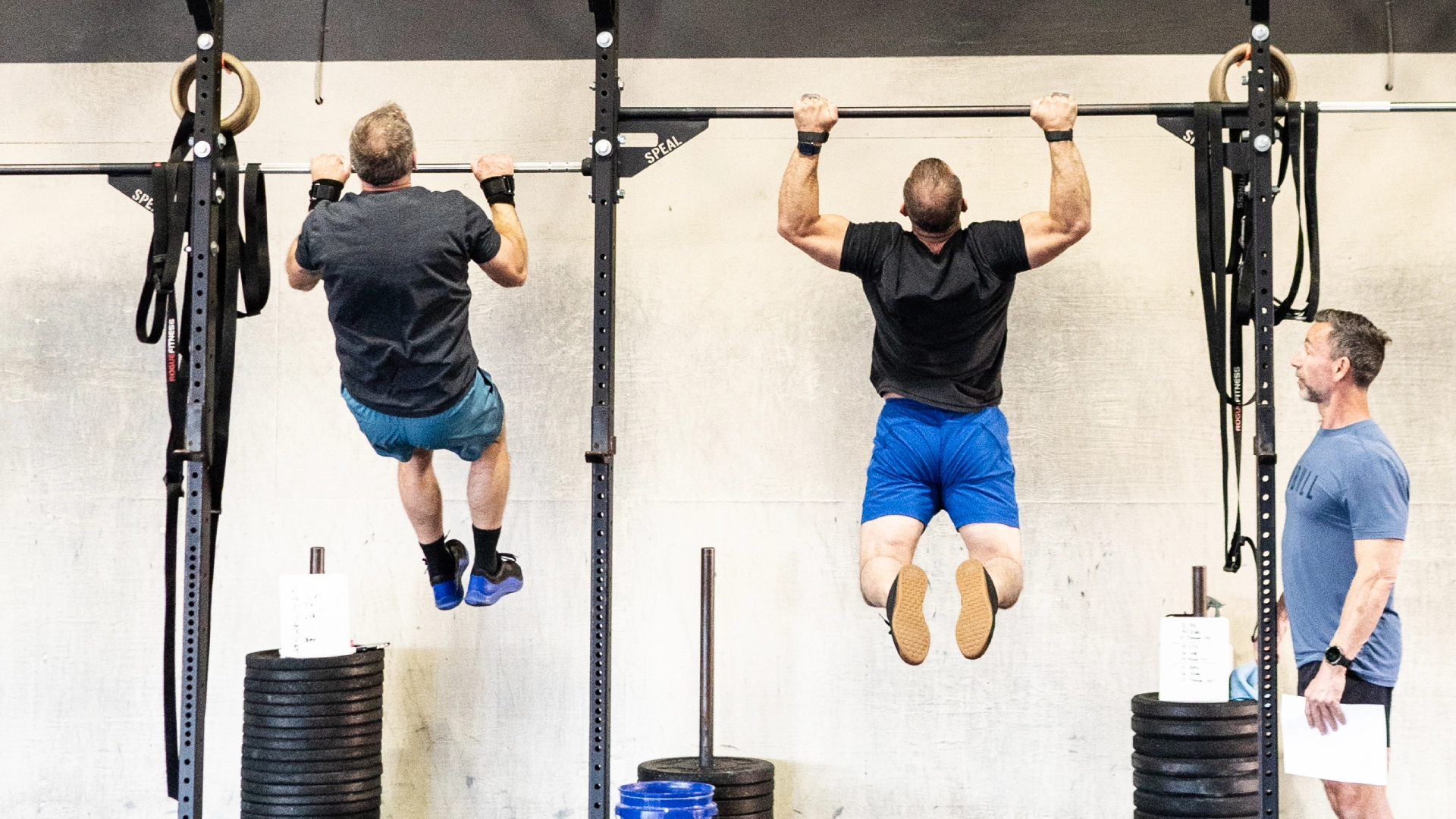 Interior view of TriPower Strength & Conditioning, a Strength & Conditioning gym in Eustis, FL, with members participating in workouts.