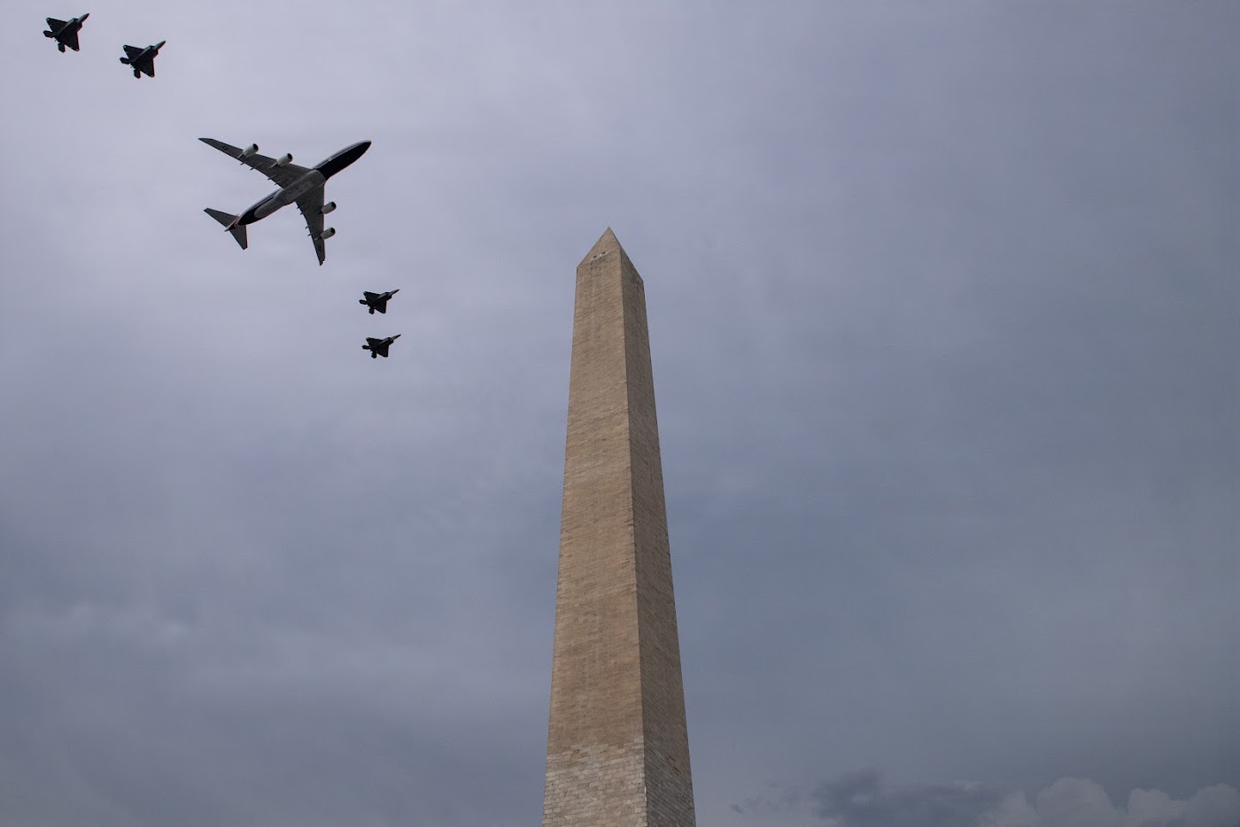 Military aircraft flyover past the Washington Monument