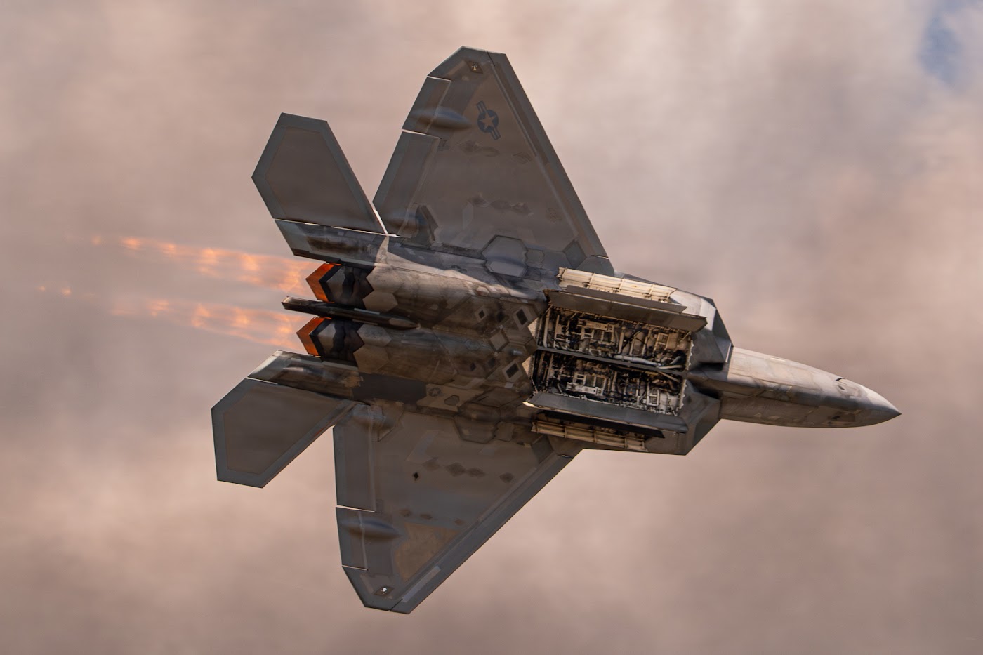 Fighter jet climbing, seen from below