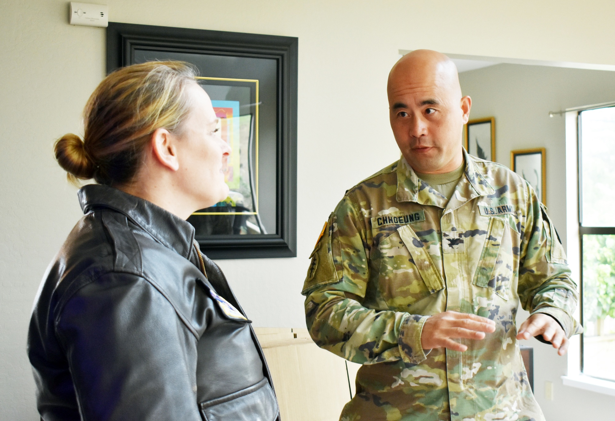 Movers pack a service member's household goods during a permanent change of station move