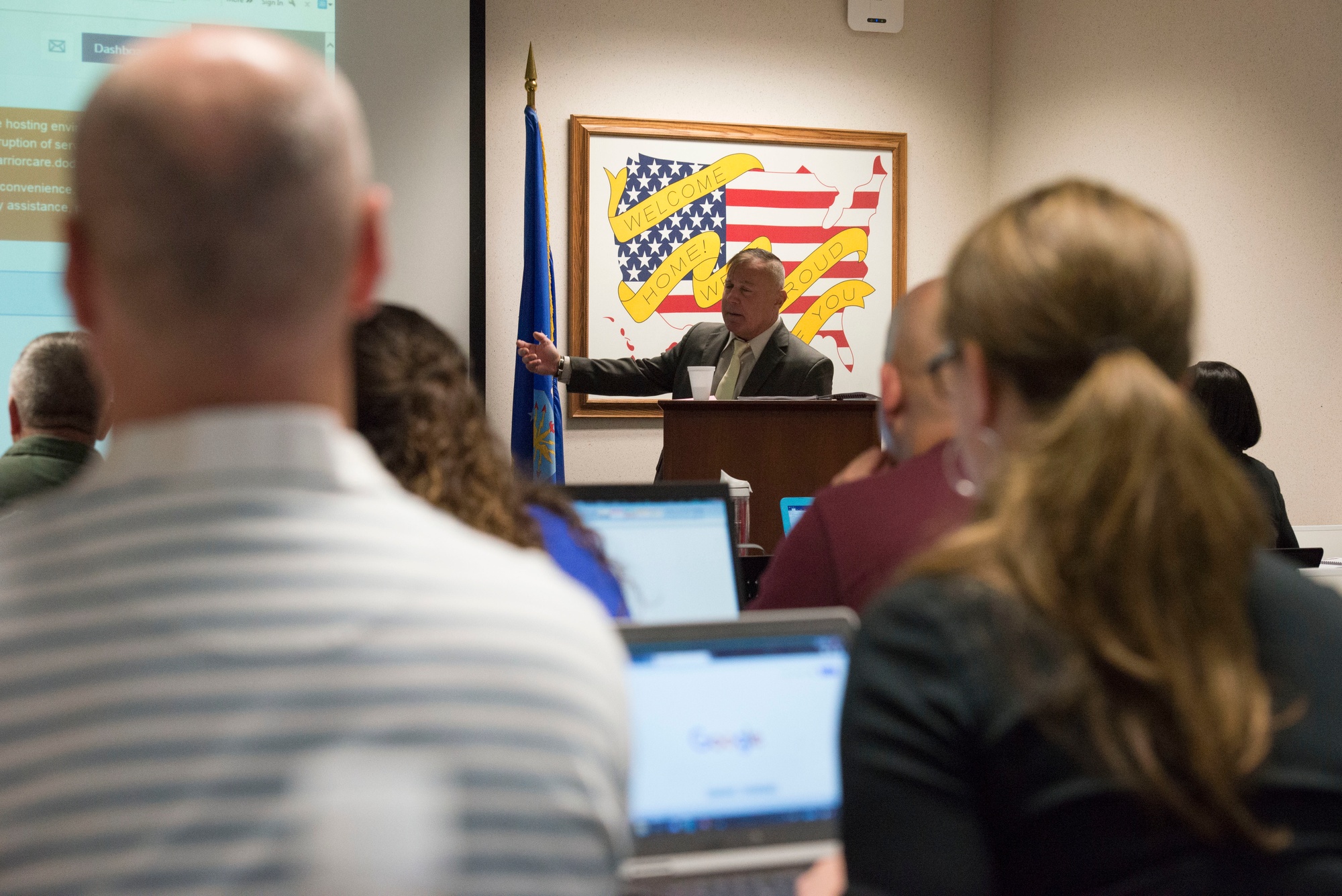 A benefits advisor briefs separating service members during a Transition Assistance Program session