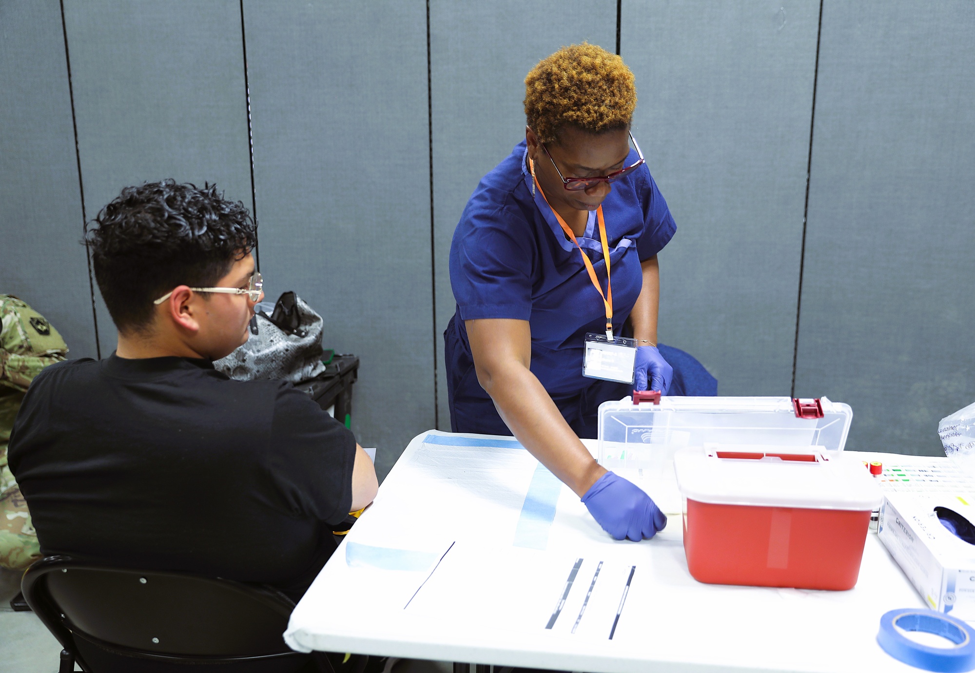 National Guard soldiers undergoing medical readiness checks at a periodic health assessment