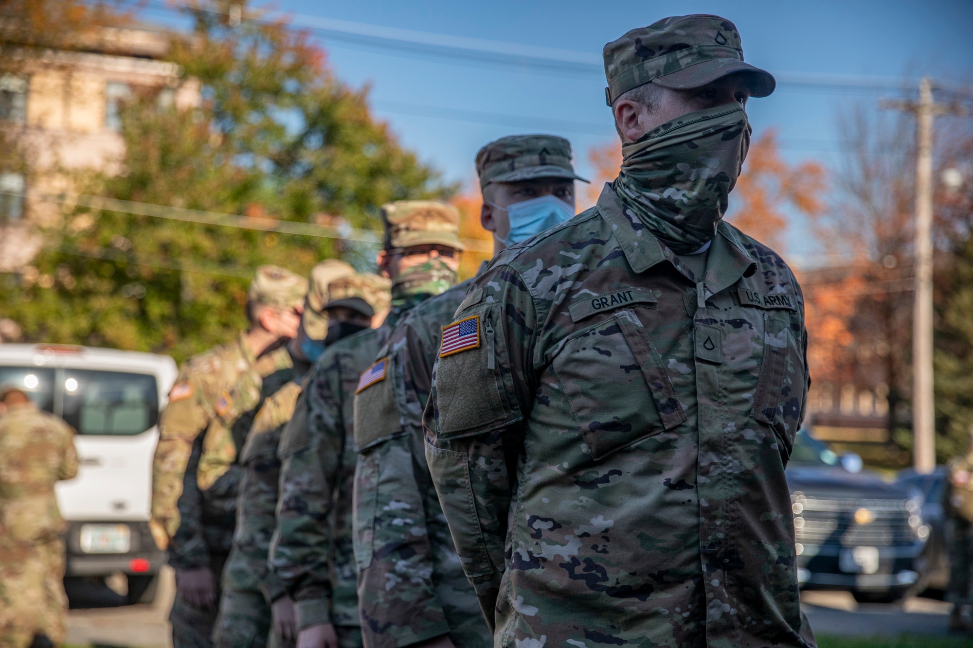 U.S. Army Reserve Soldiers wait in line to in-process during their unit's Soldier Readiness Process ahead of mobilization